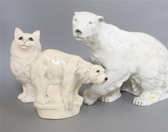 A large Royal Dux model of a polar bear, a Beswick cat and a pottery polar bear Largest polar bear 5.5cm